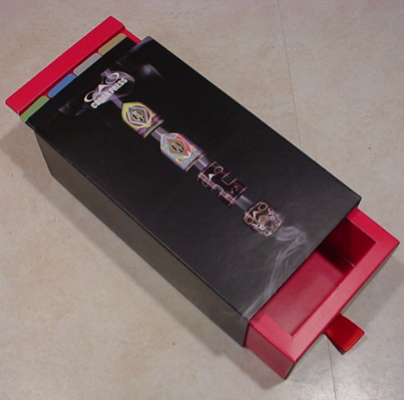 A black and red box with a sliding cover