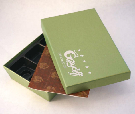 An olive-colored box